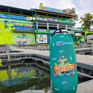 Custom wholesale boat fender cover on display in front of lakefront bar storefront